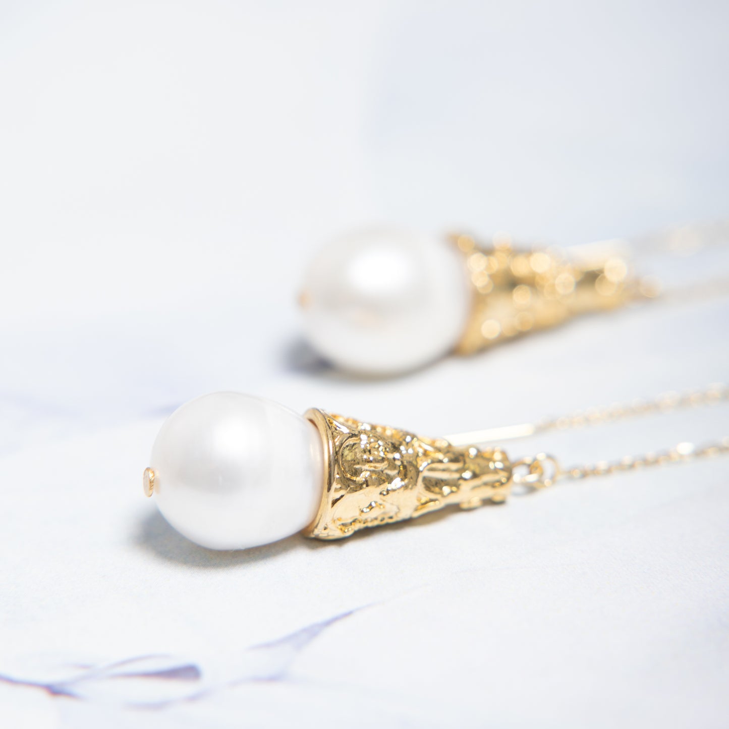 Oorbellen grote Parel Gold